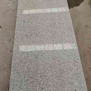 酒泉芝麻白光面毛板