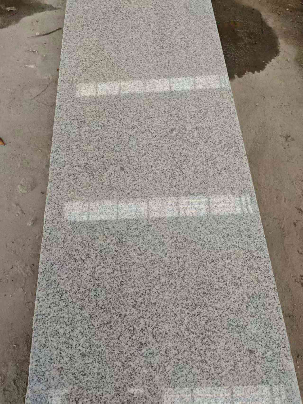 酒泉芝麻白光面毛板